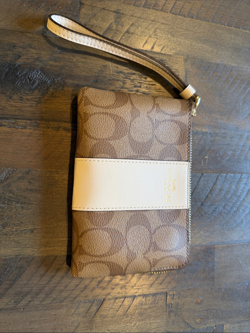 Coach Brown Signature Canvas Wristlet with Cream Center Stripe